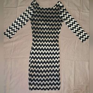 Forever 21, elbow length sleeved dress; Size medium; Color Black and gold